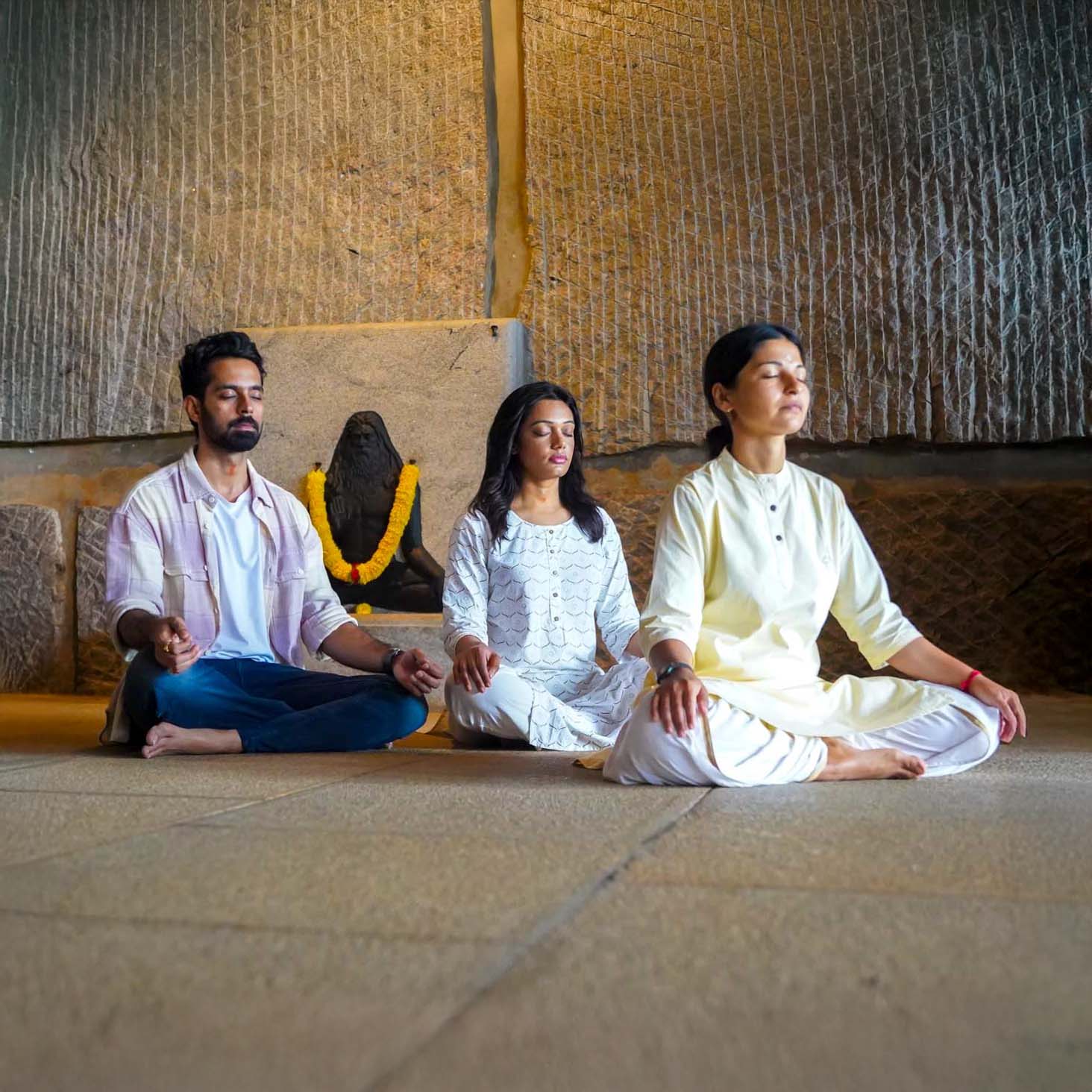 Make offerings & meditate at the Yogeshwara Linga temple at the base of the Adiyogi statue